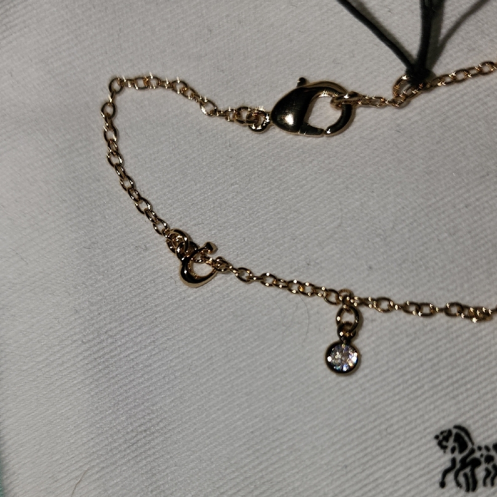 Coach Gold-Tone Delicate Charm Bracelet - Picture 3 of 7